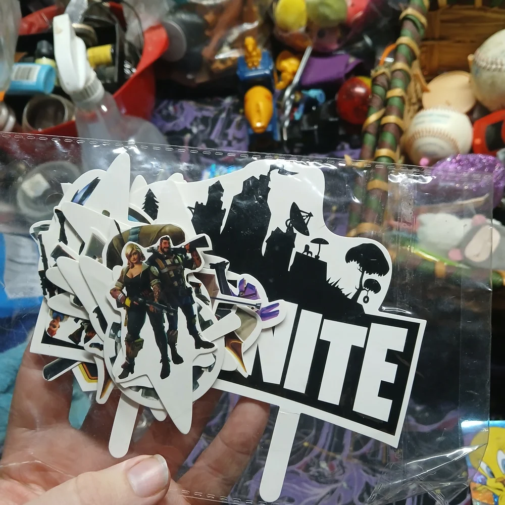 pack of assorted Fortnite stickers. battle royal